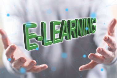 E-öğrenme kavramı, arka plandaki bir adamın ellerinden üstündür.