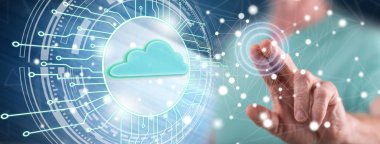 Adam dokunmatik ekranda bulut hesaplama sistemine parmağıyla dokunuyor.