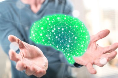 Zeka kavramı içinde geçmiş bir adamın elleri yukarıda