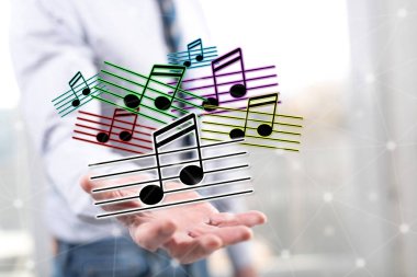 Müzik konsepti içinde geçmiş bir adamın elini yukarıda