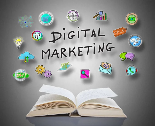 Digital marketing concept above an open book