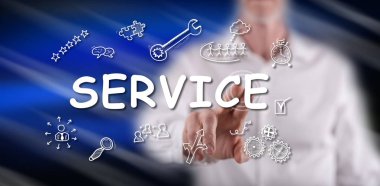 Bir adam dokunmatik ekranda bir servis konseptine parmağıyla dokunuyor.