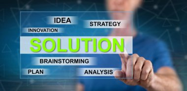 Dokunmatik ekranda çözelti konseptine parmağıyla dokunan adam.