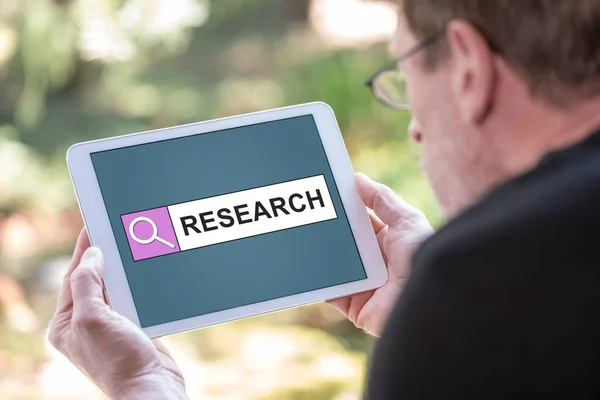 Tablet screen displaying a research concept