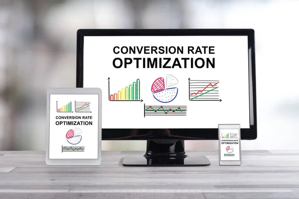 Conversion rate optimization concept shown on different information technology devices