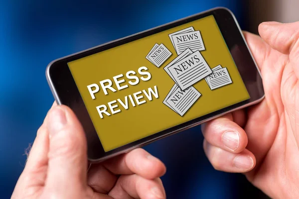 Smartphone screen displaying a press review concept