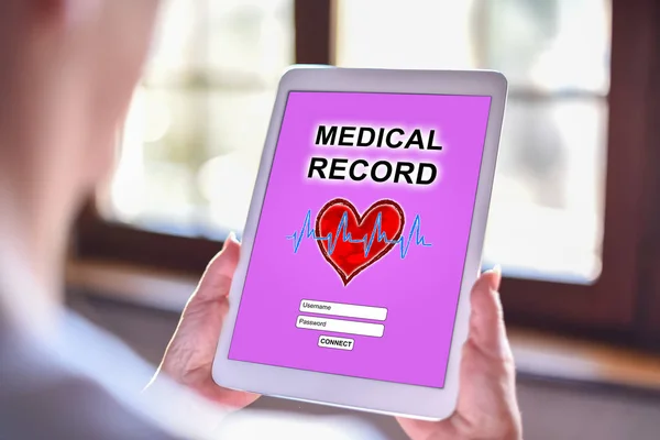 Tablet screen displaying a medical record concept