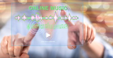 Parmaklarını dokunmatik ekranlı cep bilgisayarlarda bir online müzik konsepti dokunmadan kadın