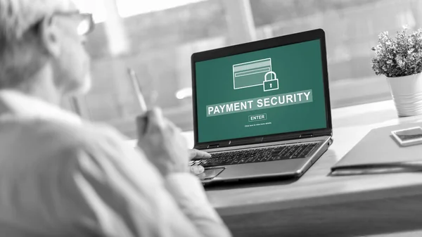 Laptop screen displaying a payment security concept
