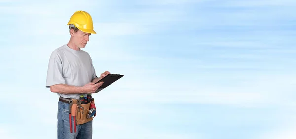 Building Worker Tool Belt Taking Notes Blurred Background — Stock Photo, Image