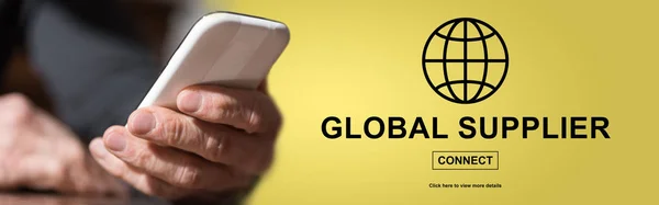 Hand holding mobil phone with global supplier concept on background