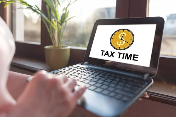 Laptop screen displaying a tax time concept