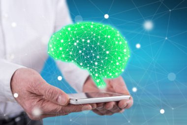 Zeka kavramı üzerinde eller tarafından düzenlenen bir akıllı telefon