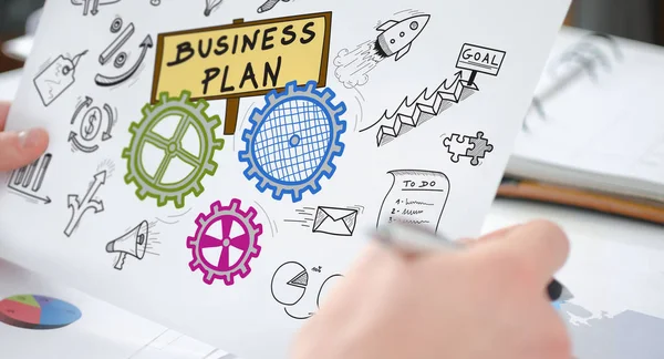 ビジネスの計画概念を示す紙を保持手 — ストック写真