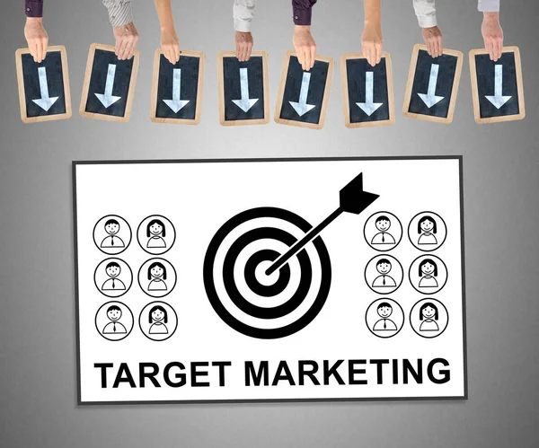 Hands holding writing slates with arrows pointing on target marketing concept