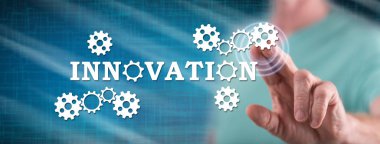 Adam dokunmatik ekranda yenilik kavramına parmağıyla dokunuyor.