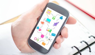 Pazarlama stratejisi kavramı bir akıllı telefon ekranýnda görüntülenen