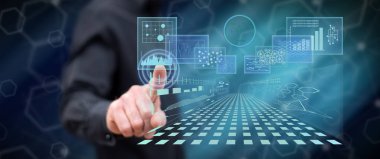 Bir adam dokunmatik ekranda dijital arayüz kavramına parmağıyla dokunuyor.