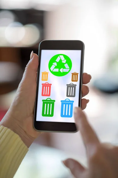Smartphone screen displaying a recycling concept