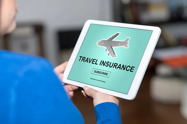 Travel insurance concept on a tablet