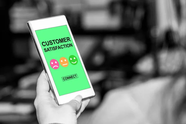 Customer satisfaction concept on a smartphone — Stock Photo, Image