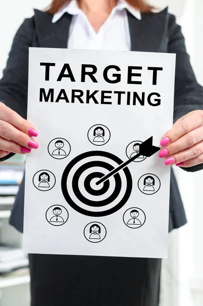 Target marketing concept shown by a businesswoman