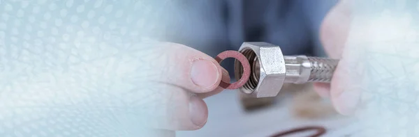 Plumber putting a gasket on a plumbing fitting. panoramic banner — Stock Photo, Image