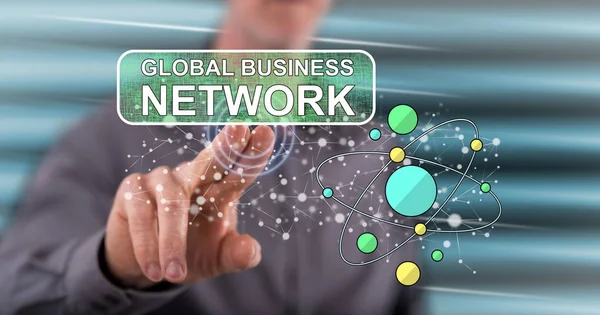 Man die een Global Business Network-concept aanraakt — Stockfoto