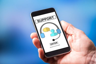 Destek kavramı bir smartphone cep telefonu ile