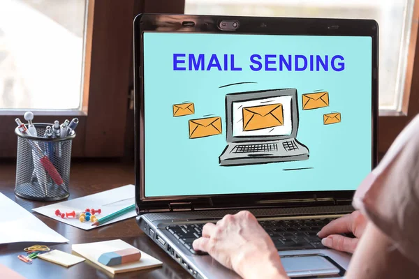 Email sending concept on a laptop screen — Stock Photo, Image