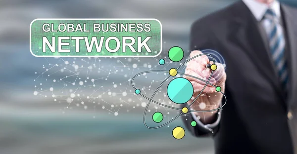 Человек, касающийся концепции глобальной бизнес-сети — стоковое фото