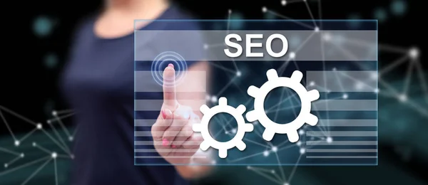 Woman touching a seo concept — Stock Photo, Image