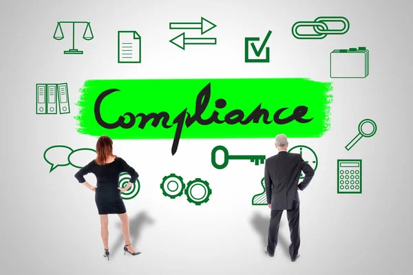 Compliance concept watched by business people