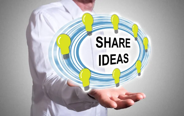 Share ideas concept above a human hand