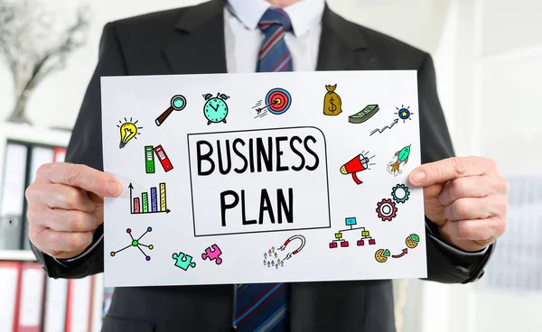 Business plan concept shown by a businessman — Stock Photo, Image