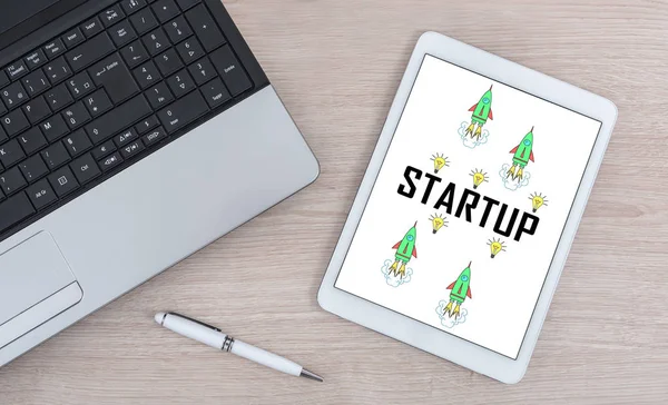 Startup concept on a digital tablet — Stock Photo, Image