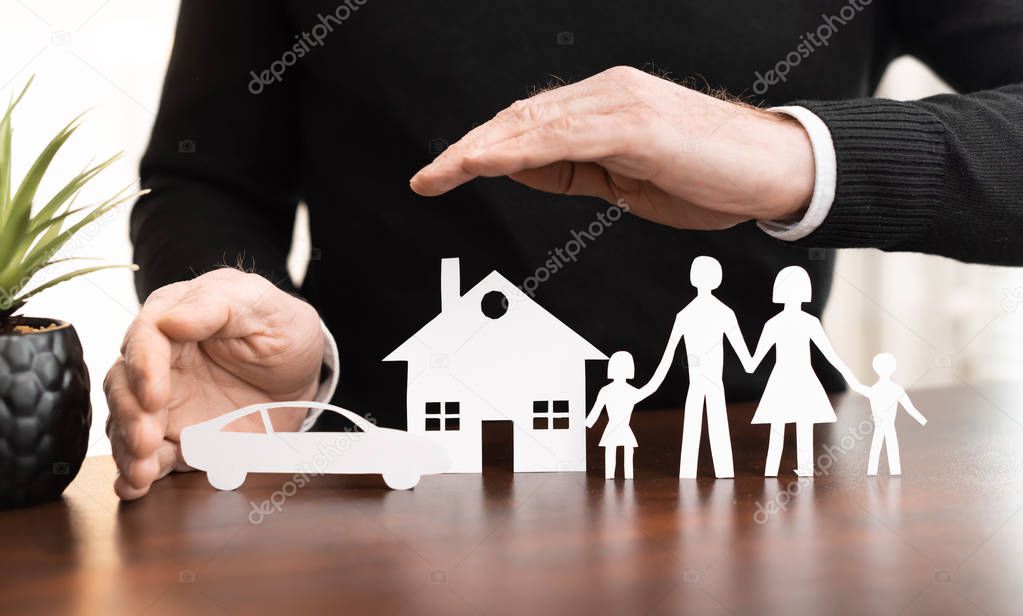 Concept of family, home and car insurance