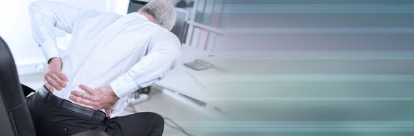 Businessman suffering from back pain; panoramic banner — Stock Photo, Image