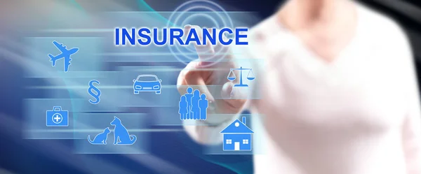 Woman touching an insurance concept — Stock Photo, Image
