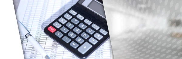 Calculator on financial documents, accounting concept; panoramic — Stock Photo, Image