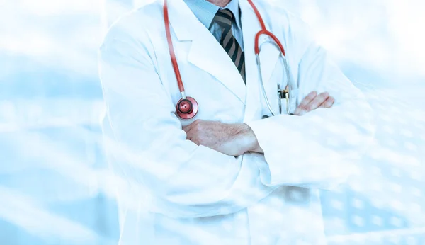 Doctor with arms crossed; light effect — Stock Photo, Image