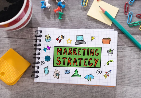 Concepto de estrategia de marketing en un bloc de notas — Foto de Stock