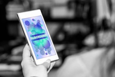 Blockchain kavramı bir smartphone cep telefonu ile