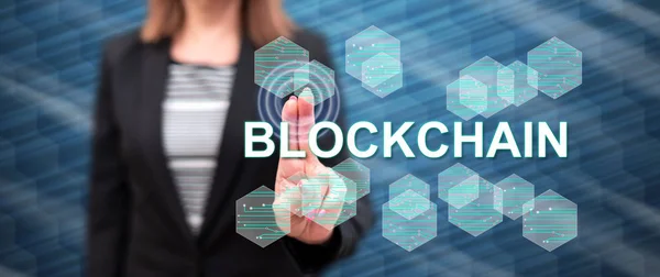 Woman touching a blockchain concept — Stock Photo, Image