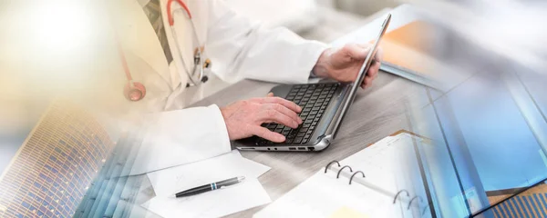 Male doctor using laptop; multiple exposure — Stock Photo, Image