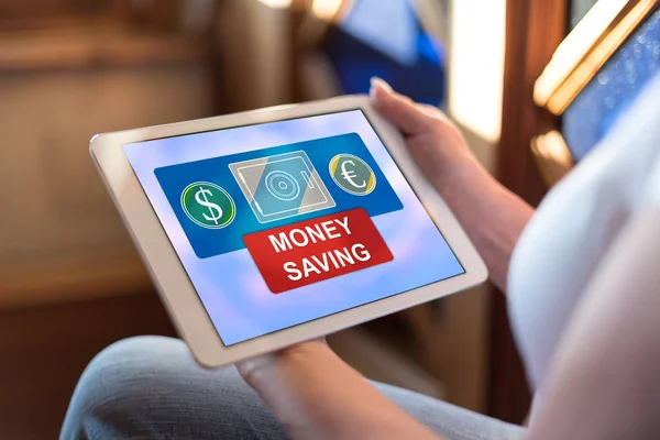 Concetto di risparmio di denaro su un tablet — Foto Stock