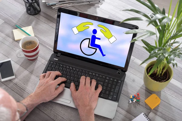 Disability insurance concept on a laptop