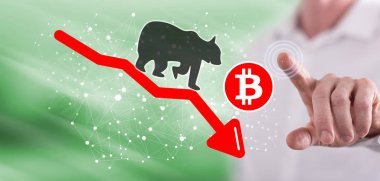 Bitcoin ayı trendi konseptine dokunan adam