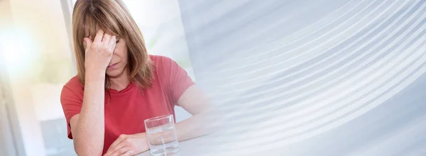 Mature woman having a headache, light effect; panoramic banner — Stock Photo, Image