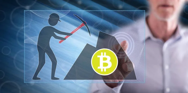 Man die een bitcoin Mining concept aanraakt — Stockfoto